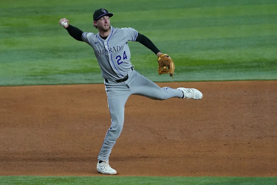 Colorado Rockies third baseman Ryan McMahon (24) throws to first base during the fifth inning against the Texas Rangers at Globe Life Field.Raymond Carlin III-Imagn Images