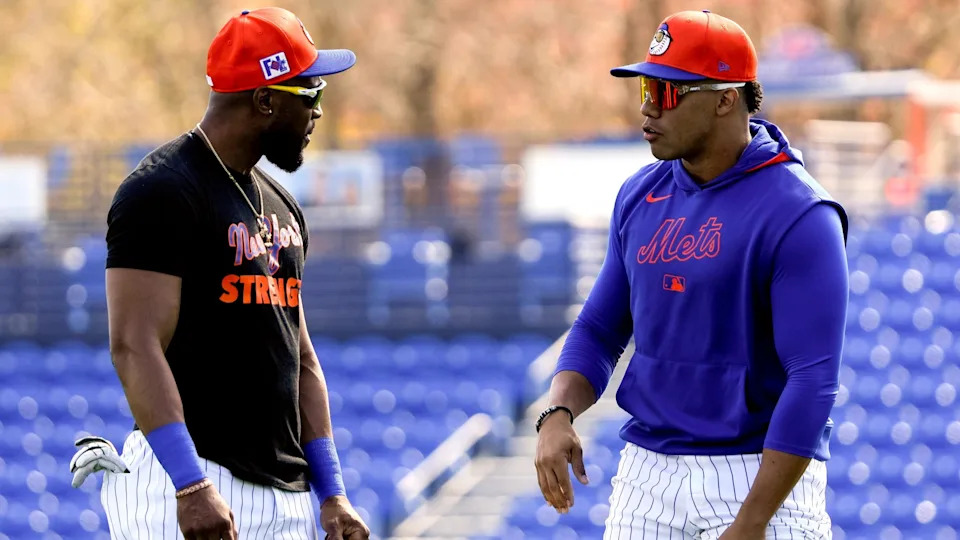 New York Mets outfielders Starling Marte (left) and Juan Soto chat during the first day of a full-squad workout during Spring Training at Clover Park on Monday, Feb. 17, 2025, in Port St. Lucie.