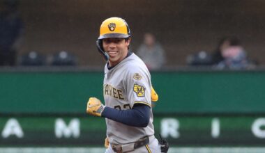 Carlos Rodriguez bridges delay, earns first MLB win