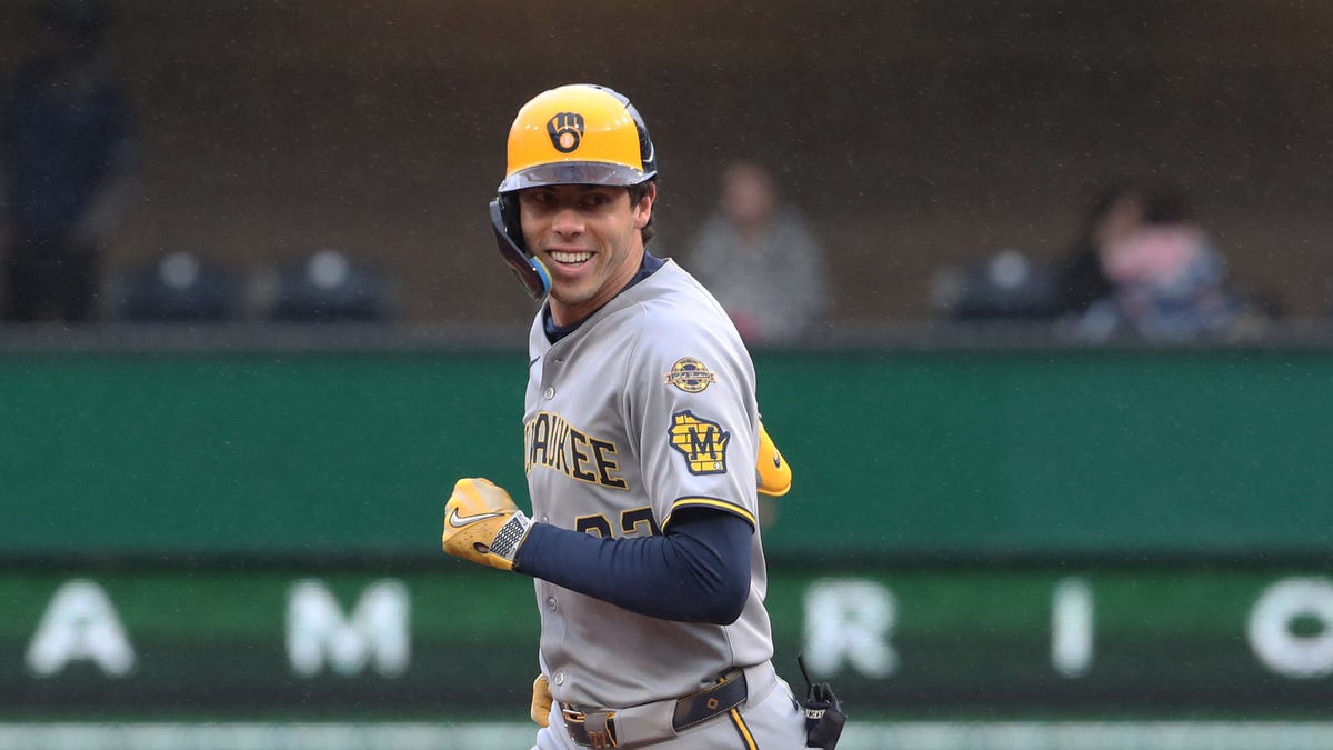 Carlos Rodriguez bridges delay, earns first MLB win