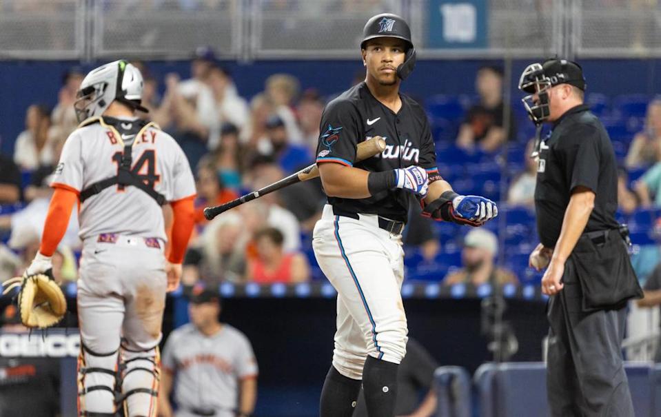 Miami Marlins left fielder Heriberto Hernandez (64) reacts after striking out against the San Francisco Giants in the third inning of their MLB game at loanDepot park on Friday, May 30, 2025, in Miami, Fla.