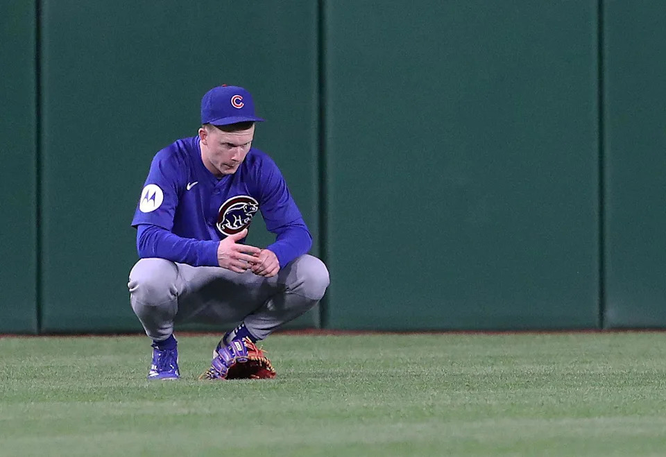 Player Pete Crow-Armstrong reacts after spectator falls from stand