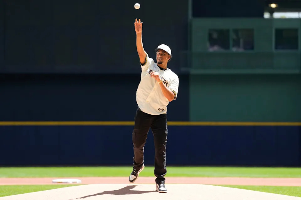 May 26, 2025; Milwaukee, Wisconsin, USA; Green Bay Packers quarterback Jordan Love throws out a first pitch prior to the game between the Boston Red Sox and Milwaukee Brewers at American Family Field. Mandatory Credit: Jeff Hanisch-Imagn Images