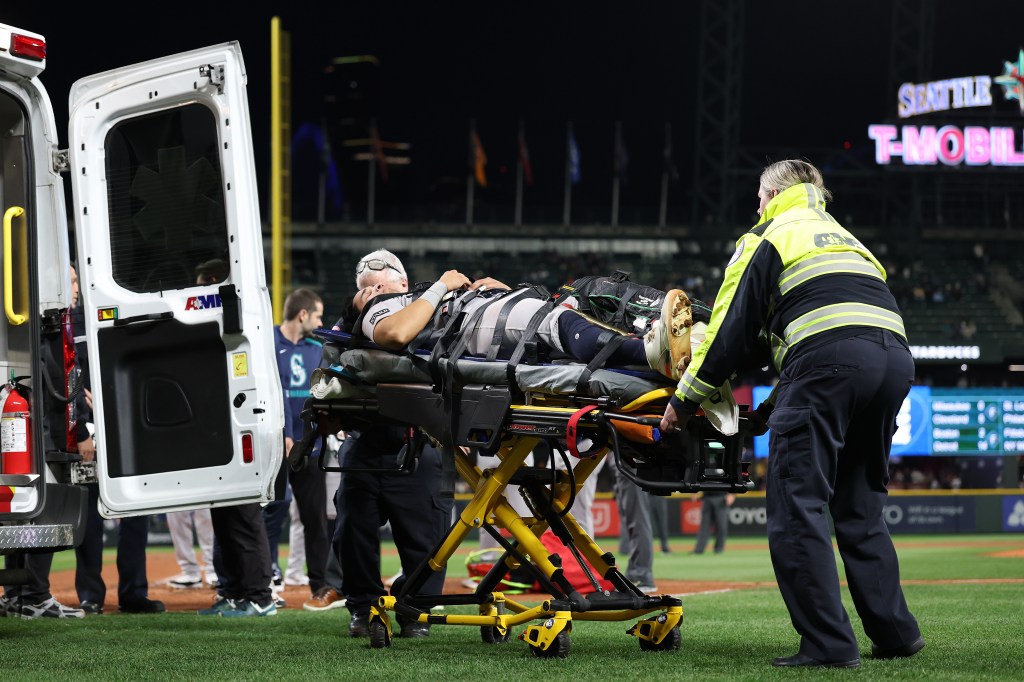 Oswaldo Cabrera is loaded into an ambulance after suffering an injury on May 12, 2025.