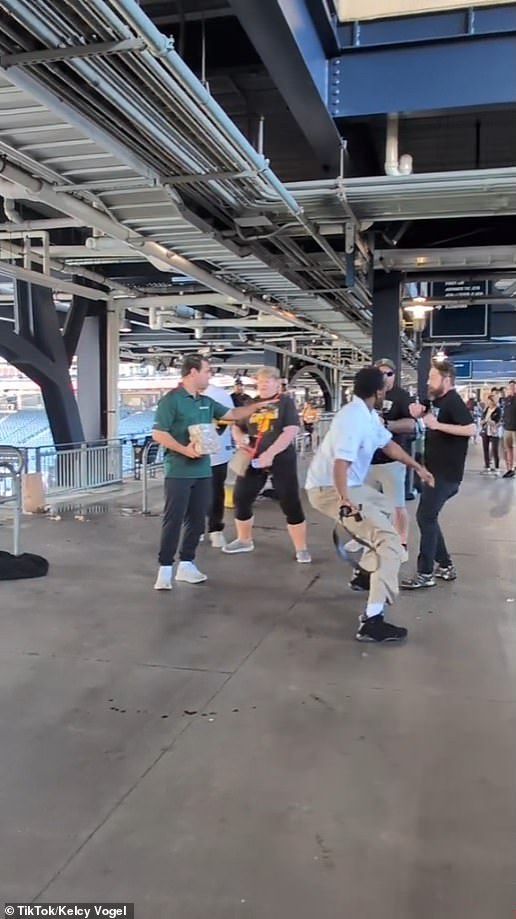 The staff member hurled punches and even attempted to whip the fan with a belt