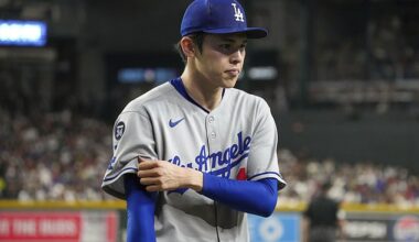 Roki Sasaki walks off the field in Phoenix after giving up five runs in four innings