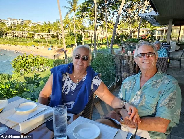 Prosecutors say Spohr was 'executed' with a bullet to the back of his head, while Wood was struck by gunfire, vomited and bled on the couch before she crawled to a bathroom where she managed to call 911