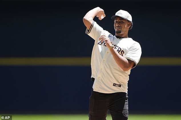 Green Bay Packers quarterback Jordan Love tossed out the first pitch at a Brewers game