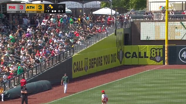 Kotsay is seen walking towards the left-field corner, where he could access the clubhouse