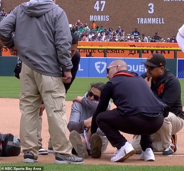 The grounds crew member was in significant pain as he received medical attention
