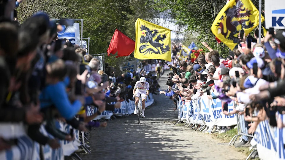 Pogačar rides through the crowd during last month's victory in the Tour of Flanders. (Jan de Meuleneir/Belga/AFP via Getty Images)