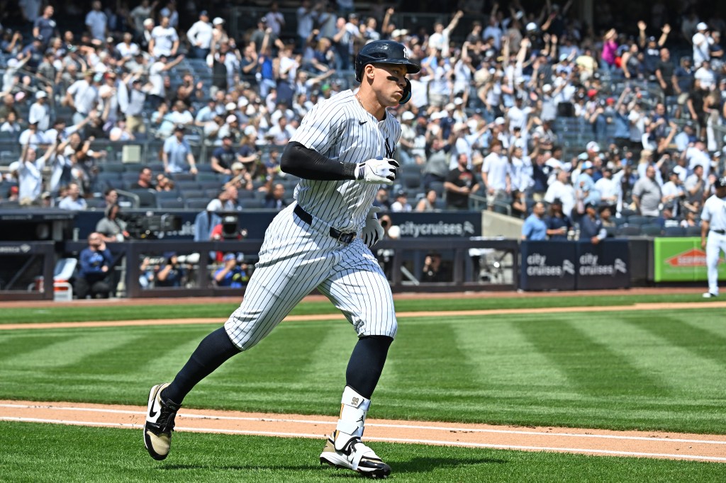Aaron Judge rounds the bases after hitting a home run during the Yankees' game against the Rays on May 3.