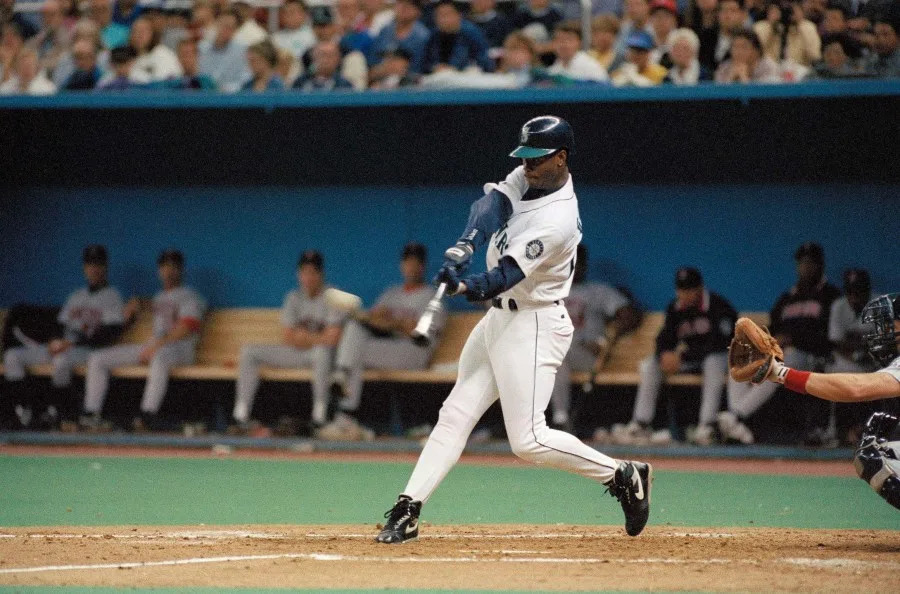 Ken Griffey Jr.of the Seattle Mariners collects a double off pitcher Scott Erickson of the Minnesota Twins during the third inning in Seattle, July 30, 1993. (AP Photo/Gary Stewart)