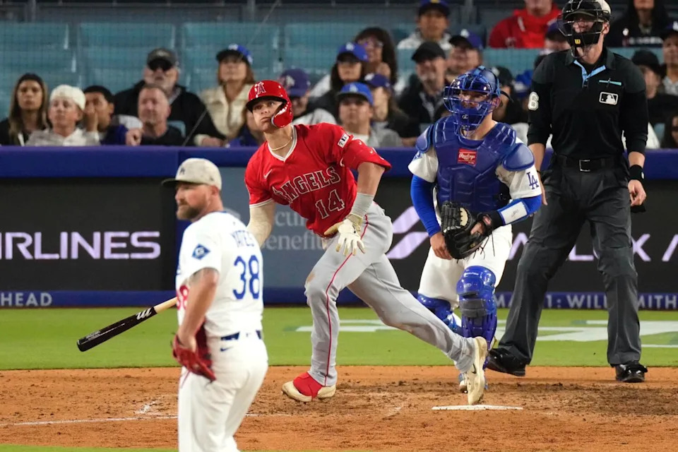 Logan O'Hoppe hits a three-run home run off Dodgers reliever Kirby Yates in the seventh inning Saturday.