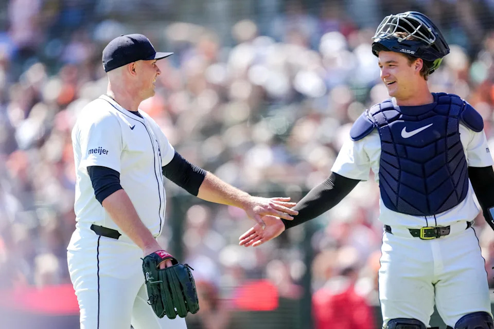 Tarik Skubal of the Detroit Tigers high-fives Dillon Dingler after the end of the top of the sixth inning against the Baltimore Orioles at Comerica Park in Detroit on Sunday, April 27, 2025.