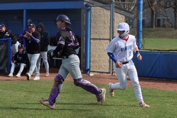Streamwood graduate Nick Weaver reacts scoring a run for Elgin Community College during a game this season. (ECC photo)