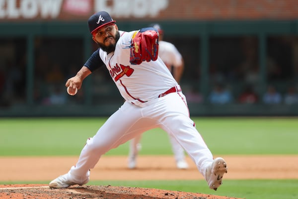 Braves relief pitcher Daysbel Hernandez delivers to a Detroit Tigers batter during the eighth inning at Truist Park on June 19, 2024, in Atlanta. One could argue Hernandez has been the Braves' best pitcher thus far. (Jason Getz/AJC)
