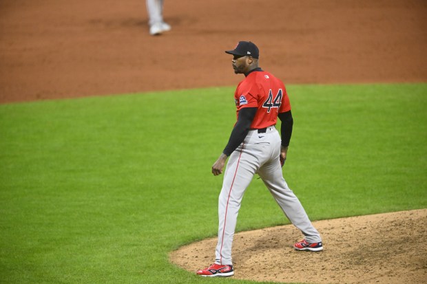Boston Red Sox relief pitcher Aroldis Chapman pitches against the Cleveland Guardians during the ninth inning of the second baseball game of a doubleheader, Saturday, April 26, 2025, in Cleveland, (AP Photo/David Richard)
