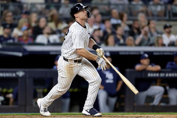New York Yankees' Paul Goldschmidt hits a three-run home run during the fifth inning of a baseball game against the Tampa Bay Rays, Friday, May 2, 2025, in New York. (AP Photo/Adam Hunger)