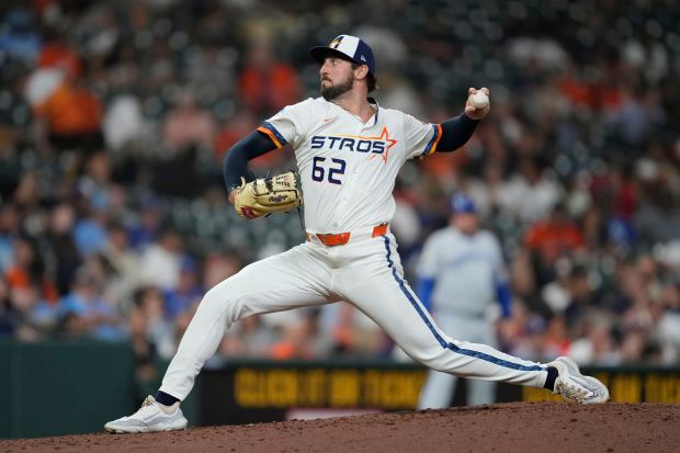 Houston Astros relief pitcher Bennett Sousa throws during the fifth inning of a baseball game against the Kansas City Royals in Houston, Monday, May 12, 2025. (AP Photo/Ashley Landis)