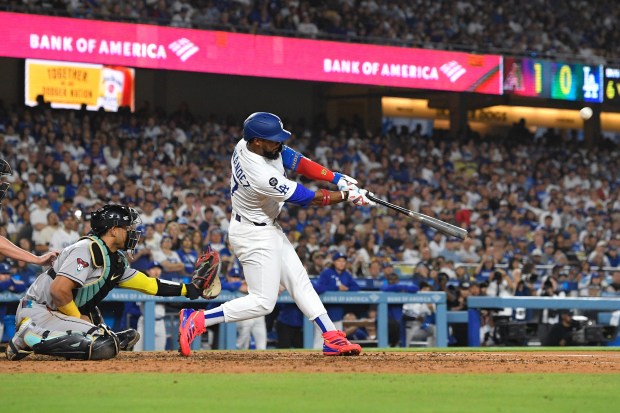 The Dodgers’ Teoscar Hernández hits a go-ahead three-run home run...