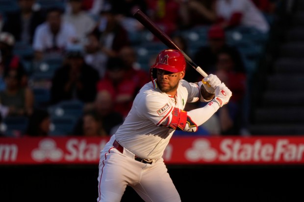 The Angels’ Yoan Moncada bats during the first inning of...