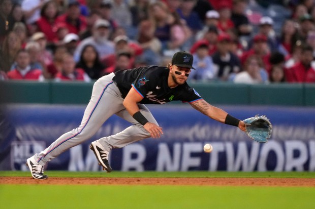 Miami Marlins third baseman Connor Norby makes a stop on...