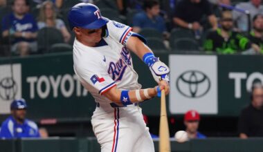 Texas Rangers' Josh Jung hits a home run during the first inning of a baseball game against the Colorado Rockies, Tuesday, May 13, 2025, in Arlington, Texas. (AP Photo/LM Otero)