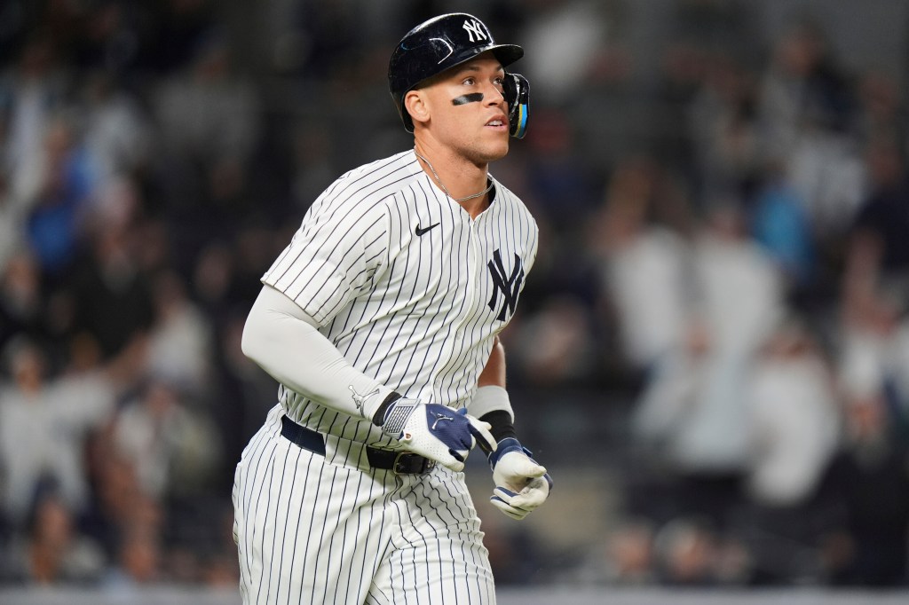 New York Yankees' Aaron Judge runs the bases after hitting a two-run home run during the eighth inning of a baseball game against the Texas Rangers Tuesday, May 20, 2025, in New York.