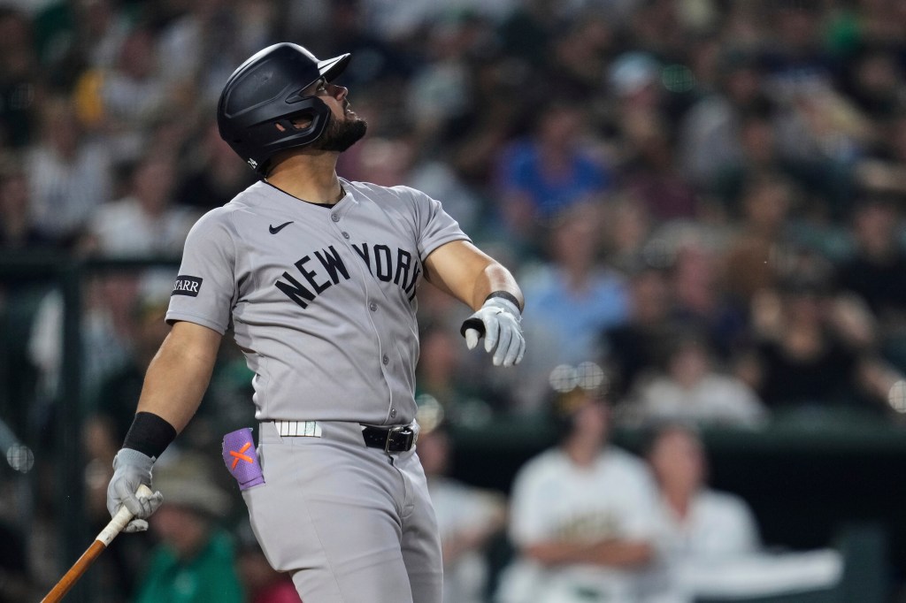New York Yankees' Jasson Domínguez watches his sacrifice fly during the fifth inning of a baseball game against the Athletics, Friday, May 9, 2025, in West Sacramento, Calif.