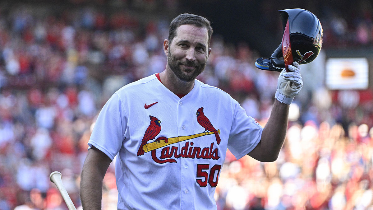 St. Louis Cardinals pinch hitter Adam Wainwright (50) tips his cap as he receives a standing ovation after his final at bat during the eighth inning against the Cincinnati Reds at Busch Stadium.
