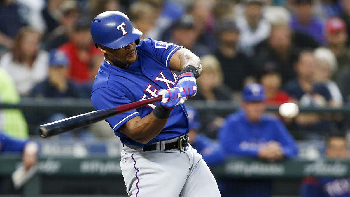 Texas Rangers designated hitter Adrian Beltre (29) hits an RBI-double against the Seattle Mariners during the first inning at Safeco Field.
