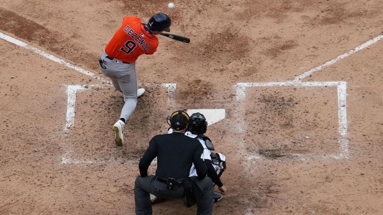 Houston Astros' Zach Dezenzo (9) hits a two-run home run during the fifth inning of a baseball game against the Chicago White Sox in Chicago, Sunday, May 4, 2025. (AP Photo/Nam Y. Huh)