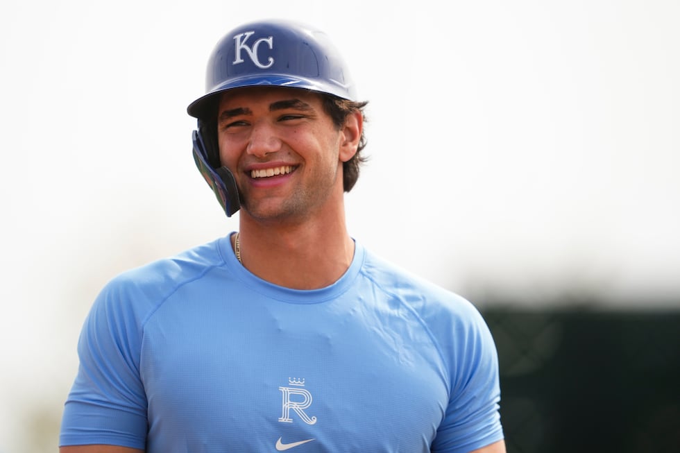 Kansas City Royals' Jac Caglianone smiles during live batting practice during spring training...