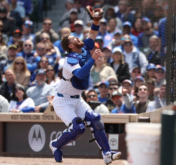 Chicago Cubs catcher Carson Kelly catches a foul pop in the first inning Wednesday, May 7, 2025, at Wrigley Field. (Brian Cassella/Chicago Tribune)