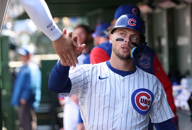 Chicago Cubs second base Nico Hoerner celebrates after scoring in the fourth inning Wednesday, May 7, 2025, at Wrigley Field. (Brian Cassella/Chicago Tribune)