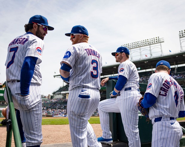 Chicago Cubs shortstop Dansby Swanson, first baseman Justin Turner, outfielder Ian Happ and outfielder Pete Crow-Armstrong take the field Wednesday, May 7, 2025, at Wrigley Field. (Brian Cassella/Chicago Tribune)