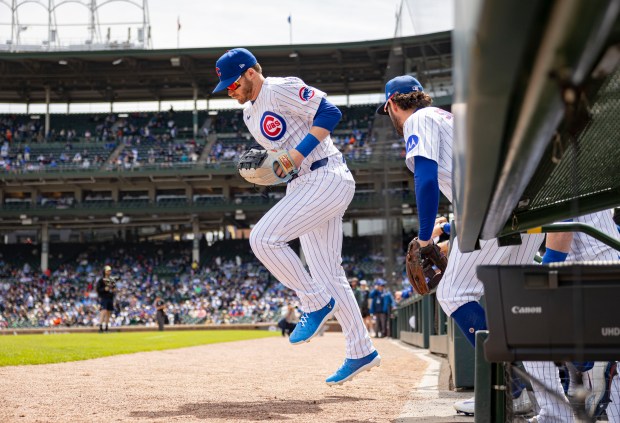 Chicago Cubs outfielder Ian Happ takes the field Wednesday, May 7, 2025, at Wrigley Field. (Brian Cassella/Chicago Tribune)