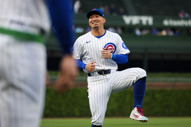 Chicago Cubs outfielder Seiya Suzuki (27) warms up for a game against the Colorado Rockies on Wednesday, May 28, 2025, at Wrigley Field. (Audrey Richardson/Chicago Tribune)