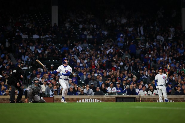 Cubs center fielder Pete Crow-Armstrong watches the flight of his solo home run to right field during the fourth inning against the Rockies on May 28, 2025, at Wrigley Field. (Audrey Richardson/Chicago Tribune)