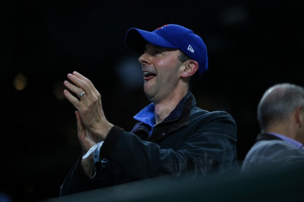 A Cubs fan cheers after center fielder Pete Crow-Armstrong's home run against the Rockies on May 28, 2025, at Wrigley Field. (Audrey Richardson/Chicago Tribune)