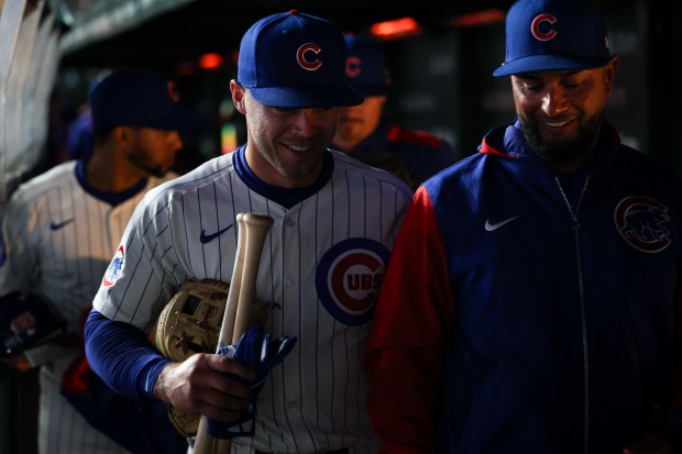 Cubs second baseman Nico Hoerner, left, heads to the clubhouse after a 2-1 win over the Rockies on May 28, 2025, at Wrigley Field. (Audrey Richardson/Chicago Tribune)