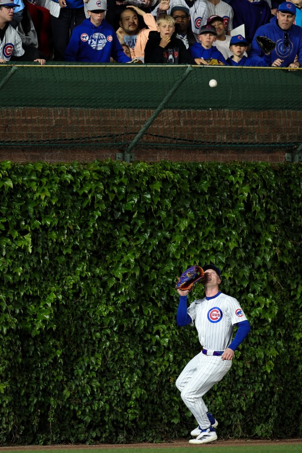Cubs center fielder Pete Crow-Armstrong camps under a long flyout from Rockies second base Tyler Freeman during the sixth inning on May 28, 2025, at Wrigley Field. (Audrey Richardson/Chicago Tribune)
