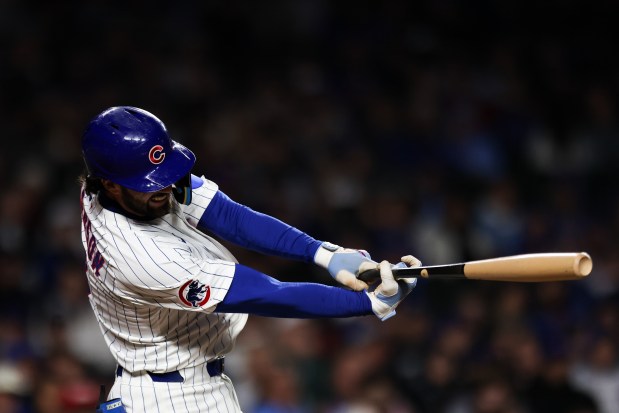 Cubs shortstop Dansby Swanson swings during the seventh inning against the Rockies on May 28, 2025, at Wrigley Field. (Audrey Richardson/Chicago Tribune)