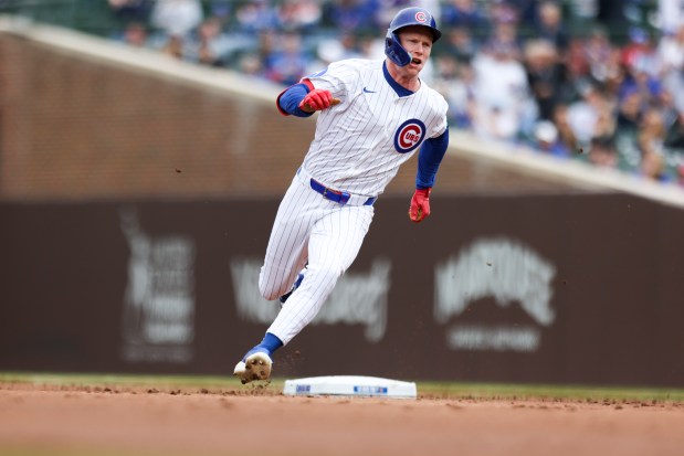 Chicago Cubs outfielder Pete Crow-Armstrong (4) rounds second base after hitting a triple in the first inning against the Chicago White Sox at Wrigley Field on Sunday, May 18, 2025. (Eileen T. Meslar/Chicago Tribune)