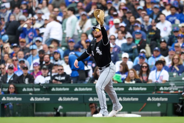 Chicago White Sox first baseman Tim Elko (30) catches the throw to first base for an out against the Chicago Cubs in the second inning at Wrigley Field on Sunday, May 18, 2025. (Eileen T. Meslar/Chicago Tribune)
