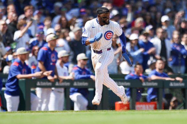 Chicago Cubs third baseman Vidal Bruján (17) runs home after outfielder Pete Crow-Armstrong (4) hit a double in the sixth inning against the Chicago White Sox at Wrigley Field on Sunday, May 18, 2025. (Eileen T. Meslar/Chicago Tribune)