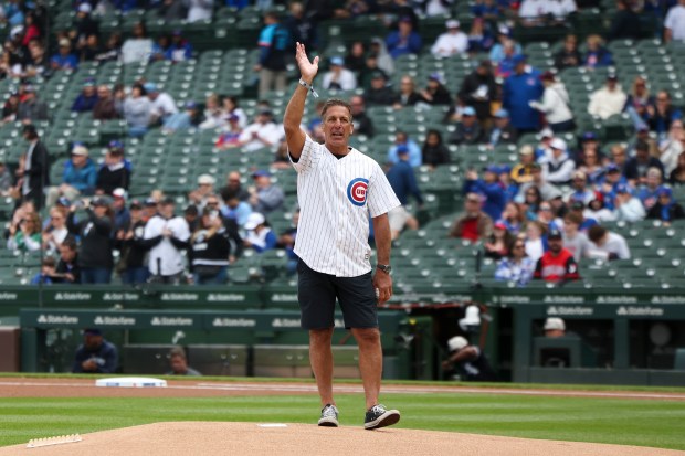 Former Chicago Blackhawks player Chris Chelios waves before throwing out a first pitch before the Chicago Cubs game against the Chicago White Sox at Wrigley Field on Sunday, May 18, 2025. (Eileen T. Meslar/Chicago Tribune)
