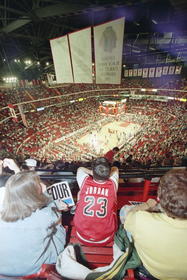 Chicago Bulls fans watch the pre-game activities before the start of Game 6 of the Eastern Conference semifinal game between the New York Knicks and the Chicago Bulls at Chicago Stadium on May 20, 1994. (John Zich/AP)
