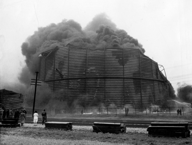 A United States Army B-24 bomber on a routine training flight from Tarrant Field, Texas, crashed on May 20, 1943, into a large gas tank on the outskirts of Midway International Airport in Chicago, killing all 12 on board. (ACME)